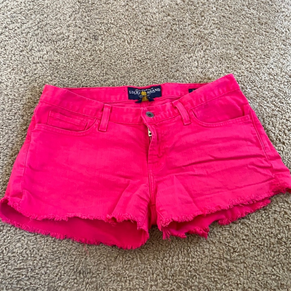 Pink frayed shorts